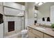 Bright bathroom with tiled shower and granite countertops at 2094 E Aris Dr, Gilbert, AZ 85298