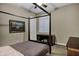 Bright bedroom with four poster bed and large window at 2094 E Aris Dr, Gilbert, AZ 85298