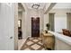Stunning foyer featuring elegant floors and a view of the dining area at 2094 E Aris Dr, Gilbert, AZ 85298