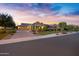 Beautiful curb appeal with landscaped front yard, brick driveway, and well-maintained exterior at 2094 E Aris Dr, Gilbert, AZ 85298