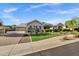 Charming home featuring manicured landscaping and a well-maintained lawn at 2094 E Aris Dr, Gilbert, AZ 85298