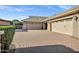 Spacious three-car garage with a large driveway offering ample parking at 2094 E Aris Dr, Gilbert, AZ 85298