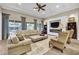 Bright living room with comfortable seating, fireplace, built-ins, and an inviting atmosphere at 2094 E Aris Dr, Gilbert, AZ 85298