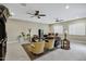 Spacious living room featuring a comfortable seating area, a wet bar, and stylish decor at 2094 E Aris Dr, Gilbert, AZ 85298
