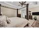 Elegantly furnished main bedroom showcasing a four-poster bed, ample space, and sophisticated decor at 2094 E Aris Dr, Gilbert, AZ 85298