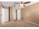 Neutral-toned bedroom with carpet flooring and a closet providing ample storage at 2150 E Sunland Ave, Phoenix, AZ 85040
