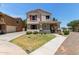 Charming two-story home featuring red shutters and a cozy front porch at 2150 E Sunland Ave, Phoenix, AZ 85040