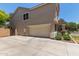 View of the garage with a spacious driveway at 2150 E Sunland Ave, Phoenix, AZ 85040
