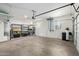 Spacious garage with bright lighting and ample storage; water heater in view at 2150 E Sunland Ave, Phoenix, AZ 85040