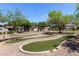 A fun community putting green provides an opportunity to enjoy outdoor recreation at 2150 E Sunland Ave, Phoenix, AZ 85040