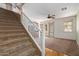 Staircase with carpet steps and white railings at 2150 E Sunland Ave, Phoenix, AZ 85040