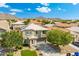 Charming two-story home features a well-manicured front yard and stunning mountain views in a friendly neighborhood at 2185 E Gillcrest Rd, Gilbert, AZ 85298