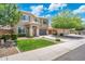 Charming two-story home with a well-manicured lawn and mature trees in a peaceful neighborhood at 2185 E Gillcrest Rd, Gilbert, AZ 85298
