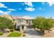 Inviting two-story home with a classic design and well-maintained lawn in a peaceful residential setting at 2185 E Gillcrest Rd, Gilbert, AZ 85298