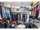 Spacious walk-in closet with ample shelving and hanging storage for all your wardrobe needs at 2185 E Gillcrest Rd, Gilbert, AZ 85298