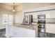Well-equipped kitchen featuring granite countertops, stainless appliances, and an island with a sink at 2281 E Saratoga St, Gilbert, AZ 85296