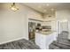 Bright and airy kitchen with stainless steel appliances, granite counters and a large island at 2281 E Saratoga St, Gilbert, AZ 85296