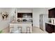 Charming kitchen featuring an island, modern appliances and stylish countertops at 24052 W Pima St, Buckeye, AZ 85326