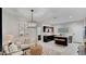 Open living space with a kitchen island, a cozy seating area, and modern finishes at 24052 W Pima St, Buckeye, AZ 85326