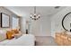 Bright main bedroom suite with neutral tones, modern lighting, and a spacious layout at 24052 W Pima St, Buckeye, AZ 85326