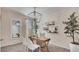 Well-lit office space featuring stylish wallpaper, modern decor and a bright aesthetic at 24052 W Pima St, Buckeye, AZ 85326