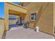 Backyard featuring a covered patio with a grill and a well-maintained patio at 2519 W Burgess Ln, Phoenix, AZ 85041