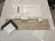 Selection of finish materials including cabinet, tile, flooring, and paint samples at 2559 E Virginia Cir, Mesa, AZ 85213