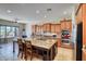 Spacious kitchen with large island, stainless appliances, and beautiful cabinetry at 26703 N 90Th Dr, Peoria, AZ 85383