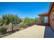 Spacious patio offers ample room for outdoor seating while enjoying privacy and views from its elevated position at 26703 N 90Th Dr, Peoria, AZ 85383