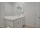 Bathroom featuring a mirror, vanity with storage, and tile flooring at 2754 S Apache Dr, Chandler, AZ 85286