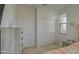 Tastefully decorated bedroom featuring two doors, a window, and neutral decor at 2754 S Apache Dr, Chandler, AZ 85286