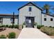 Community clubhouse featuring desert landscaping, a gated entrance, and charming architectural details at 2754 S Apache Dr, Chandler, AZ 85286