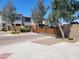 View of the community entrance gate with desert landscaping and attractive stone wall at 2754 S Apache Dr, Chandler, AZ 85286
