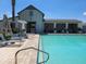 Community pool with sun loungers and a pool house, providing a refreshing escape for residents at 2754 S Apache Dr, Chandler, AZ 85286