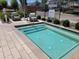 Community spa, with safety stairs and comfortable seating, great for relaxation and enjoying the outdoors at 2754 S Apache Dr, Chandler, AZ 85286