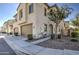 Inviting home with two-car garage, meticulously landscaped front yard, and charming architectural details at 2754 S Apache Dr, Chandler, AZ 85286