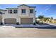 Inviting home with two-car garage, meticulously landscaped front yard, and charming architectural details at 2754 S Apache Dr, Chandler, AZ 85286