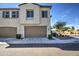 Inviting home with two-car garage, meticulously landscaped front yard, and charming architectural details at 2754 S Apache Dr, Chandler, AZ 85286