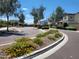 Community neighborhood entrance with attractive desert landscaping and well-maintained sidewalks at 2754 S Apache Dr, Chandler, AZ 85286