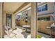 A stylish patio with pavers, patio furniture, and a grill for outdoor living and entertainment at 2754 S Apache Dr, Chandler, AZ 85286