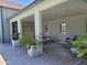 Poolside lounge featuring comfortable seating, table, and decorative plants in the background at 2754 S Apache Dr, Chandler, AZ 85286
