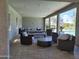 Poolside lounge features comfortable seating, a table, and a view of the community pool at 2754 S Apache Dr, Chandler, AZ 85286