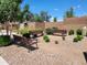 Community seating area features comfortable benches, desert landscaping, and gravel ground cover at 2754 S Apache Dr, Chandler, AZ 85286