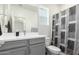 Bathroom with neutral gray vanity, and a shower and bath combo with a patterned curtain at 286 E Raleigh Dr, Chandler, AZ 85286