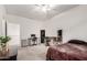 Spacious bedroom featuring neutral tones, a ceiling fan and versatile workstation for work or hobbies at 286 E Raleigh Dr, Chandler, AZ 85286