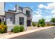 Charming gray two-story home with a two-car garage and beautifully landscaped front yard at 286 E Raleigh Dr, Chandler, AZ 85286