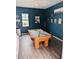 Comfortable game room featuring a pool table, modern lighting, and eclectic wall decor at 286 E Raleigh Dr, Chandler, AZ 85286