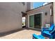 Inviting patio featuring a sliding glass door, an iron gate, and comfortable outdoor seating at 286 E Raleigh Dr, Chandler, AZ 85286