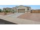 Charming single-story home with a two-car garage and a low maintenance desert landscape at 30777 W Whitton Ave, Buckeye, AZ 85396