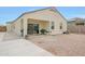 View of covered patio featuring a sliding glass door and space for grilling at 30777 W Whitton Ave, Buckeye, AZ 85396